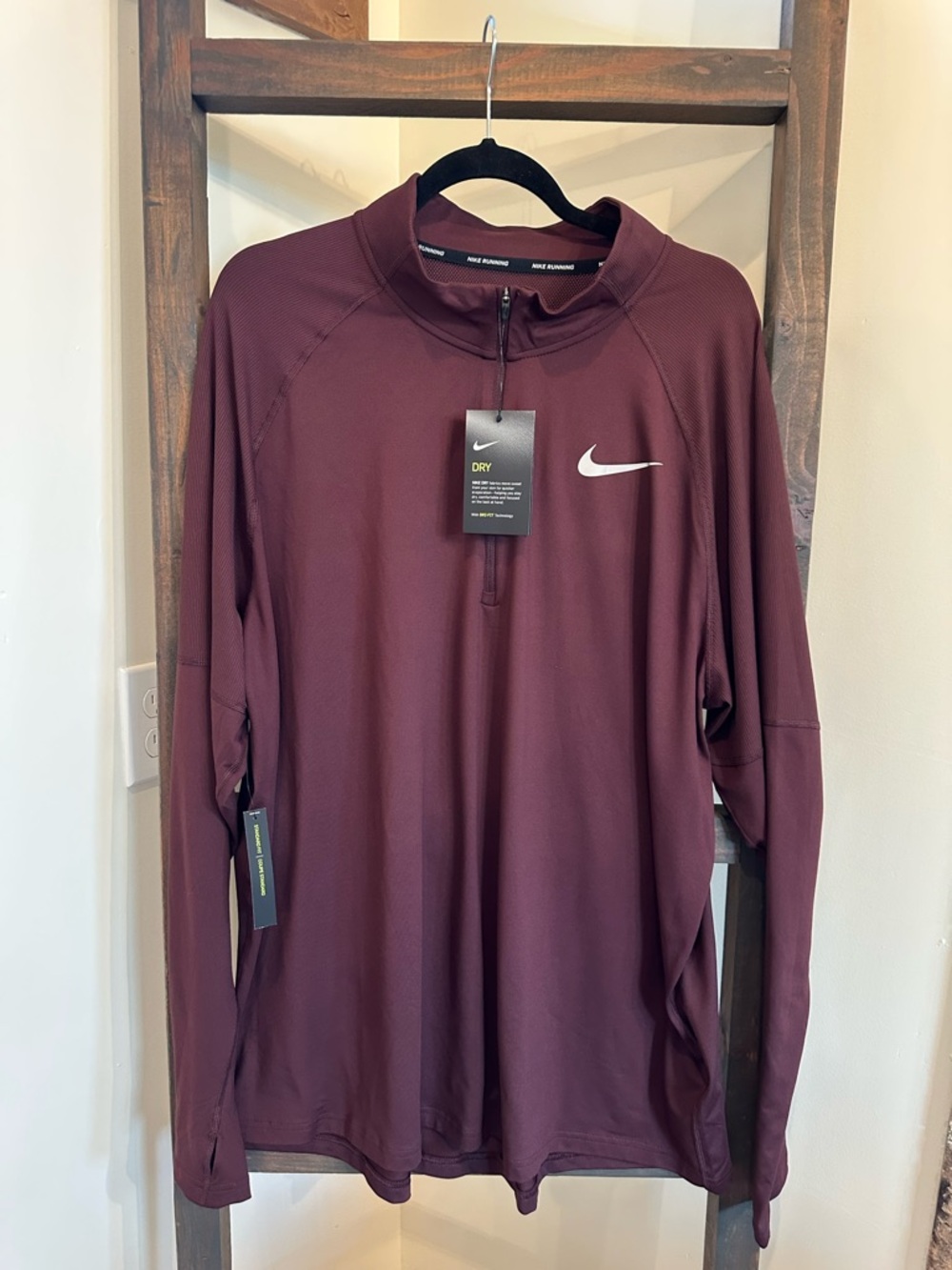 Maroon Nike pullover dry fit.